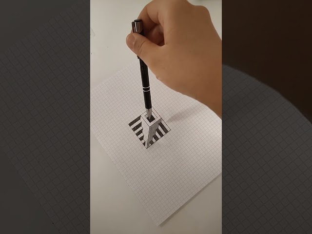 Arte 3D/ Disegno tridimensionale su foglio quadrettato