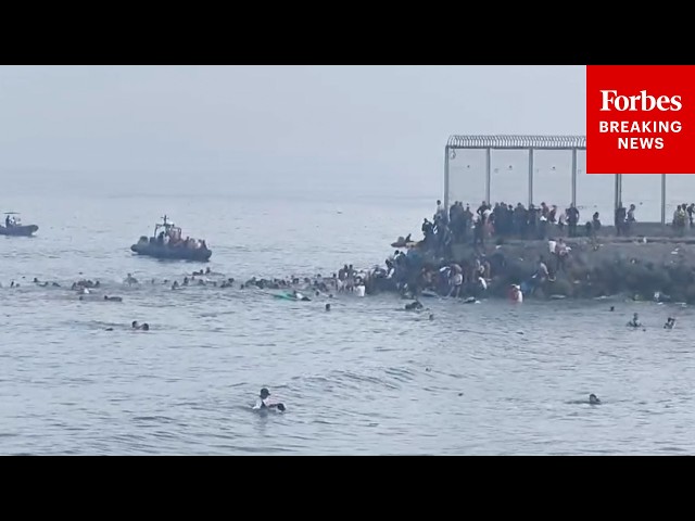 RAW VIDEO: Migrants Swim From Morocco To Enter Ceuta, Spain