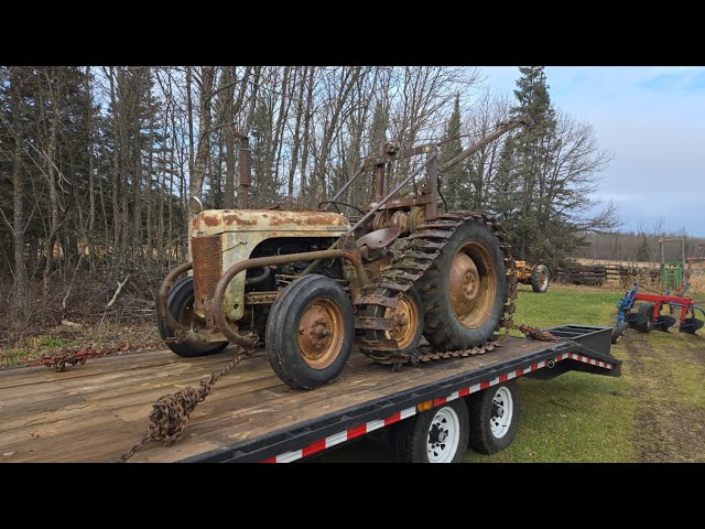 Delivering a tractor and plow then bringing home a odd tractor 