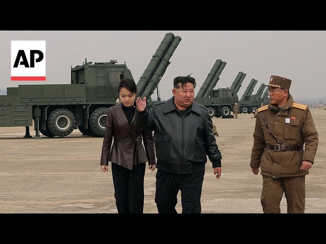 North Korea's Kim Jong Un observes rocket launch systems test with daughter