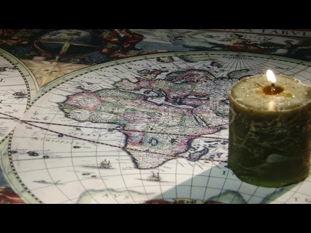 Candle, Gold Compass, Old Map. Stock Footage