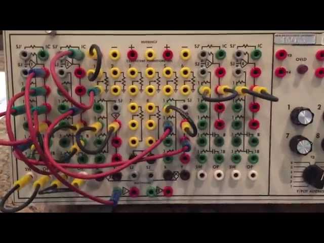 Analog computer (Comdyna GP-6) programmed to solve a simple oscillator with damping