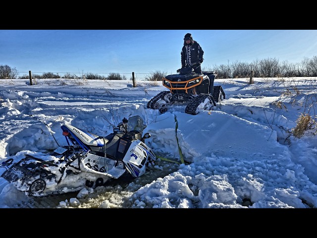 Rescuing Smashed and Sunk Snowmobiles With Electric Outlander