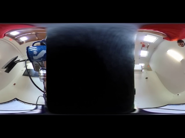 testing cafeteria table with laptop closed
