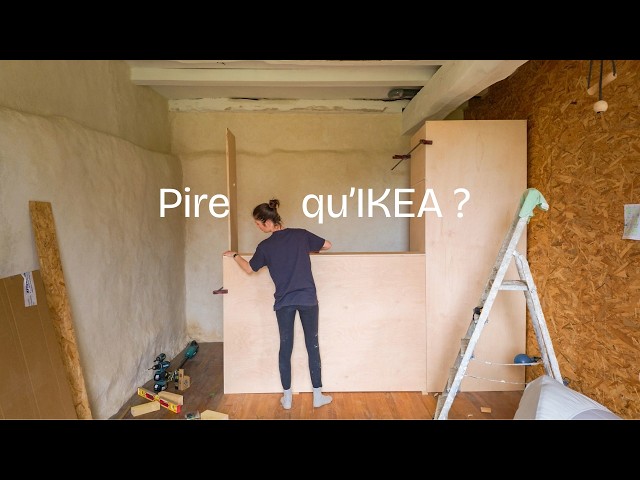 I built a hidden wardrobe behind our bed