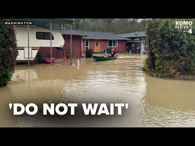 Washingtonians navigate flooded neighborhoods with kayaks as another round of evacuations issued