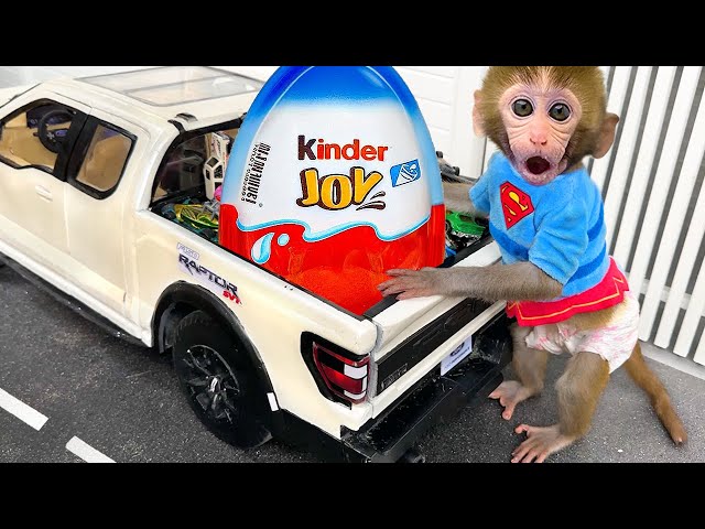 Monkey Baby Bon Bon eats kinder joy surprise eggs and plays with puppy in the swimming pool