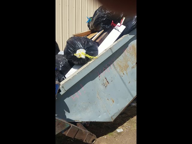 Dumping the biggest dumpster for a rear load