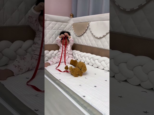 Kids probably all love animals, so Dad bought two pet dogs. The kid seems happy and deligh