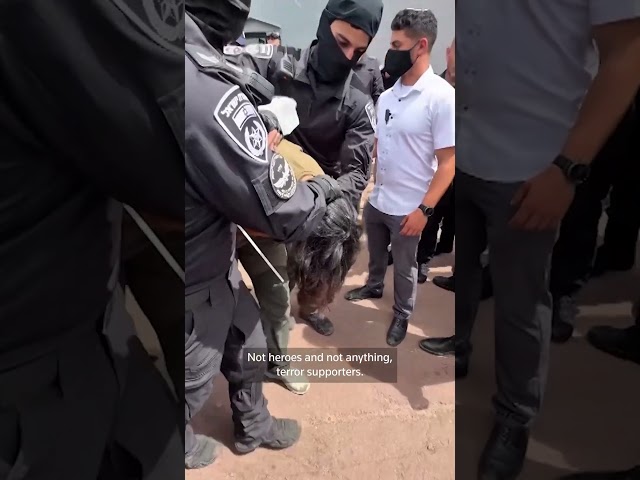 Israeli police appear to force Gaza flotilla activists to kneel with hands tied