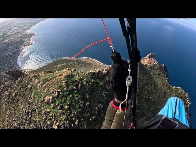 Parapendio Macari-Erice (San vito di Cadore) con viento NE despegue a sotavento