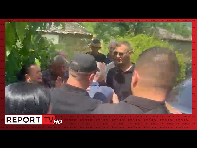Ilir Meta greeted by family and friends at his father's funeral! Accompanied by police officers