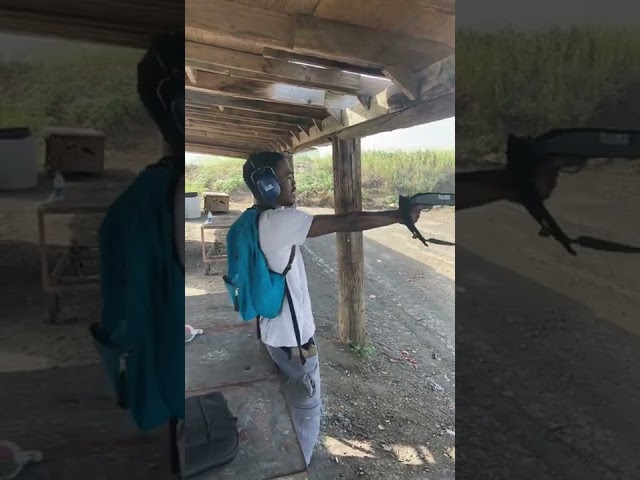 12 Gauge shotgun One Hand!!!