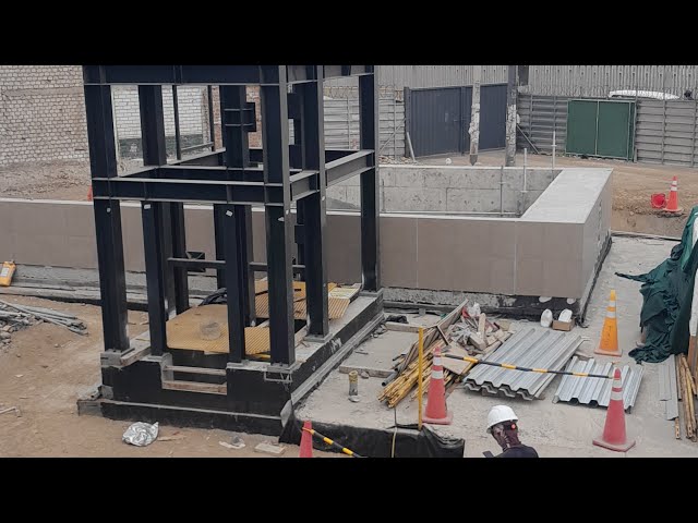 CONSTRUCTION PROGRESS AT SAN MARCOS STATION - LIMA METRO LINE 2. From the exterior.