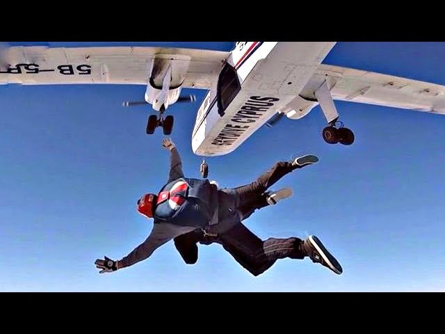 JUMPING FROM A PLANE - FIRST SKYDIVE! | 100.000 SUBSCRIBERS - GoPro Tandem Skydive from BN2 Islander