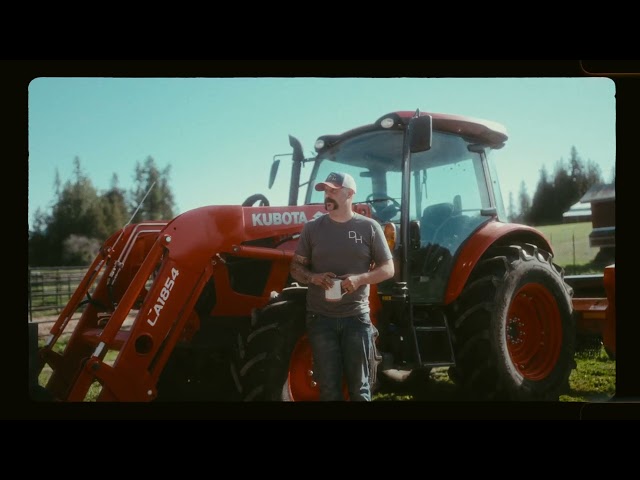 The Kubota M5 111 Moving Feed Bags | Adams Tractor