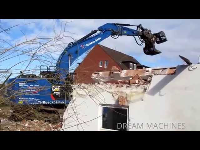 CATERPILLAR 320E BAGGER REISST WOHNHAUS AB ABBRUCH BAUSTELLE BLAUE BAUMASCHINEN DREAM MACHINES