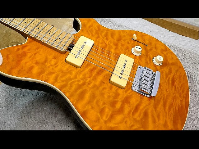 Music Man Axis Super Sport and a Strat
