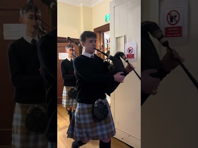 Falkirk Schools Pipe Band playing at the Tinsel Ball 2025