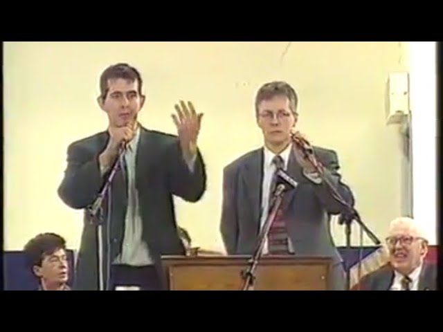 DUP farmer edwin poots challenges the UDPs Gary McMichael in Lisburn orange hall. 1990s