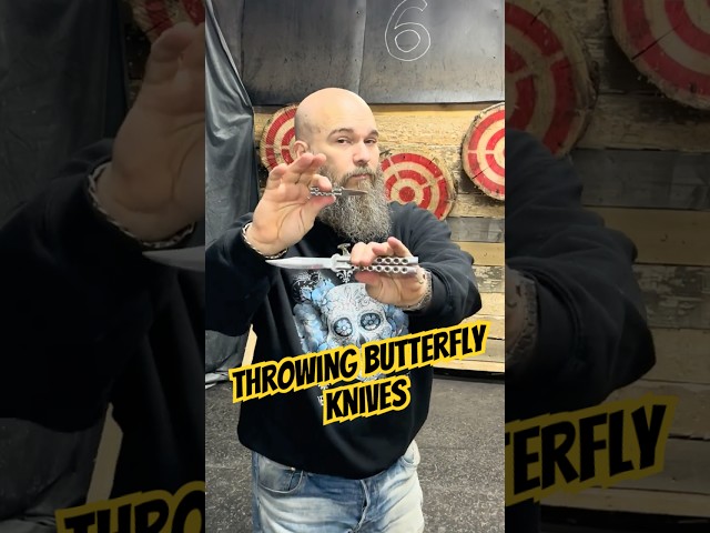 World champion knife thrower plays with butterfly knives