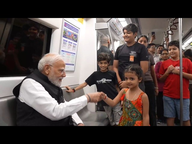 A ride to remember! PM Modi casually takes the metro to SRCC, interacts on the way…