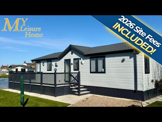 STUNNING 40x20 2 BEDROOM LODGE SITED ON A HUGE SOUTH FACING LAKESIDE PLOT ON AN ALL YEAR ROUND PARK!