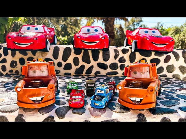 Disney Pixar Cars falling into deep pool, Lightning McQueen, Tow Mater, Mack, Sally, Francesco