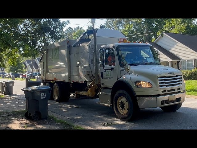121 Freightliner M2 Heil python side loader garbage truck in phenix city Alabama 