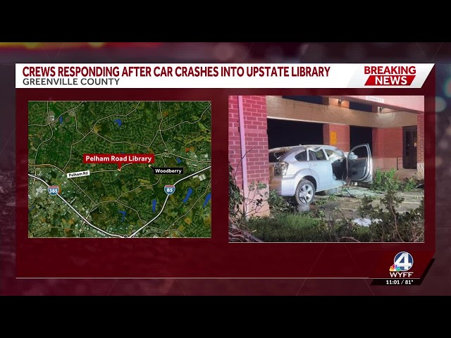 Crews responding after a car crashed into a library in Greenville County