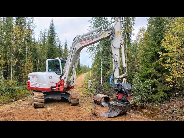 Replacing old concrete Culvert pipes in the Forest