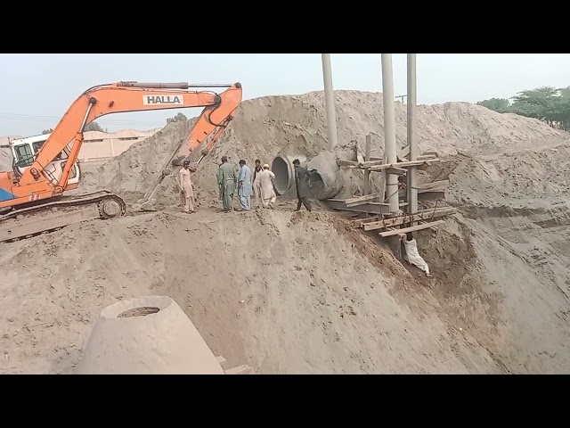 safety measures provided by the electric pole for safety during excavation work of RCC pipes.