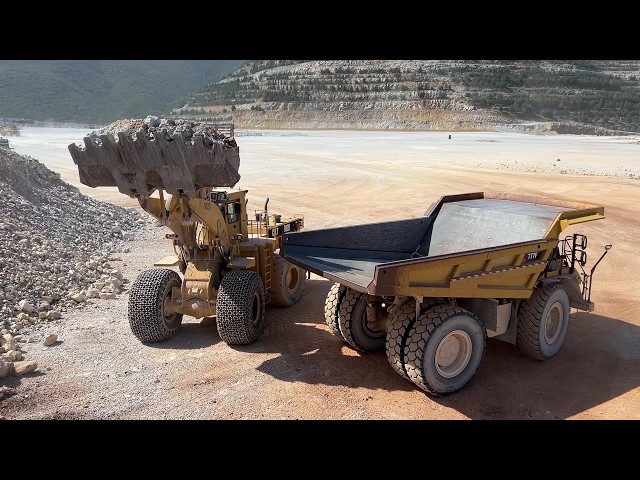 Caterpillar 992C Loading 777F Dumpers in Full Quarry Production - Interkat SA