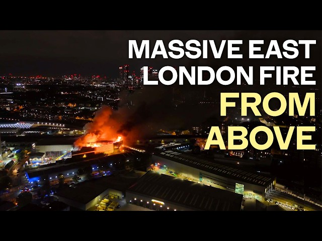 Dramatic aerial footage shows 100 firefighters tackling Deptford waste fire
