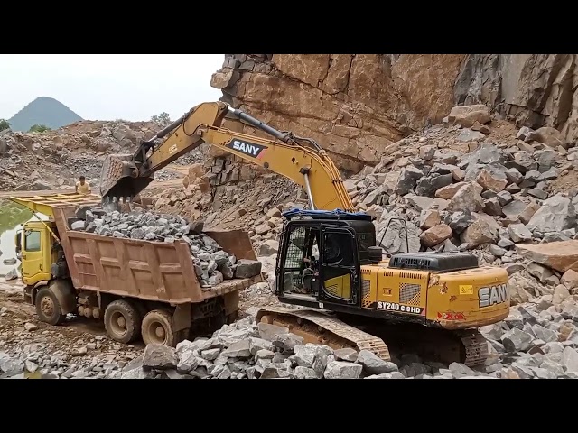 big stone loading..tata prima with sany 240.excavator .loading work