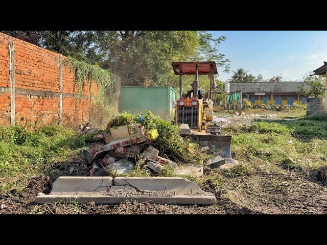 Clean up cement waste and the forest behind the school.