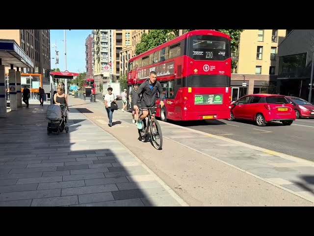 How fast? Ebike riders speeding the wrong & right way up & down a cycle lane on a floating bus stop.
