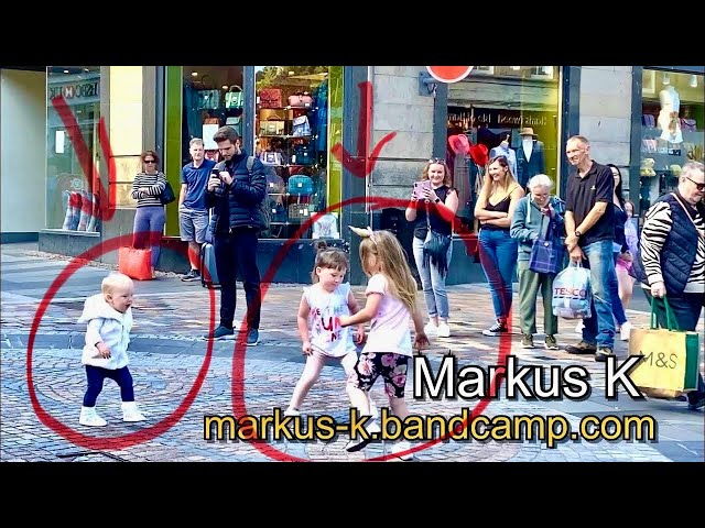 Kids Can’t Resist Busker’s Groove in Inverness - ‘Jumping Jack Flash’ (Stones)