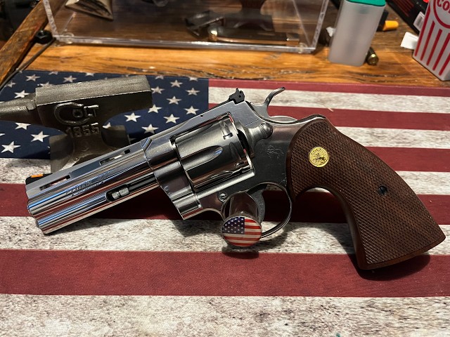 Instead of a watch for retirement I got a Colt Anaconda and Python