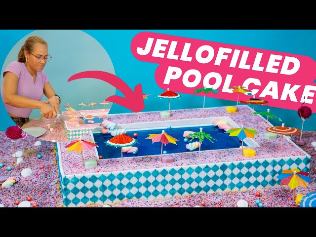 Jello-filled SWIMMING POOL CAKE with  marshmallow floaties 🍰🤣 | How to Cake It With Yolanda Gampp