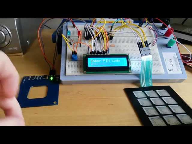 RFID key + PIN code login with PIC18F4580