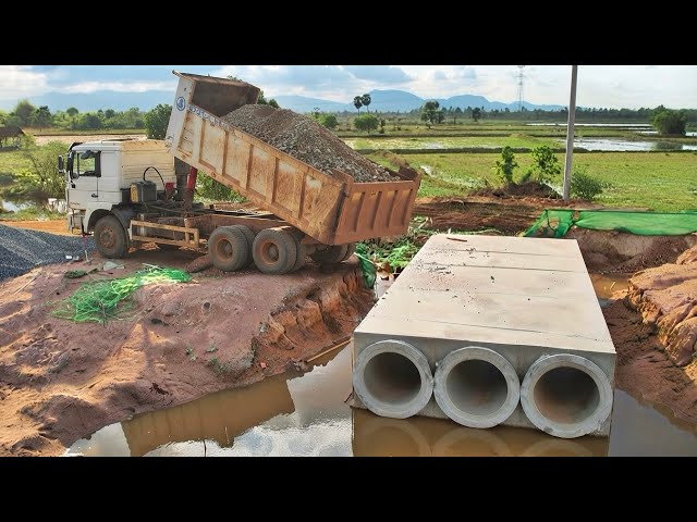 Bury the box sewer system on the newly constructed road. By HYUNDAI Excavator is Processing Work.