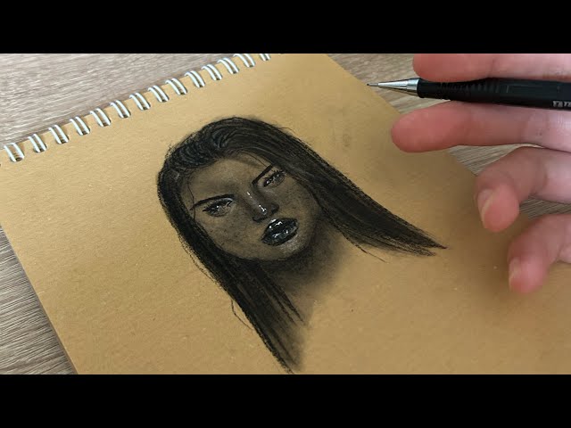 Drawing realistic portrait using charcoal