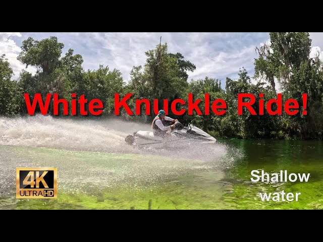 White knuckle jet ski ride on shallow spring water