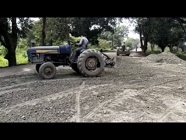 WMM Material Laying Using Tractor Planner 🚜 | Road Construction Process | Civil Engineering #Shorts