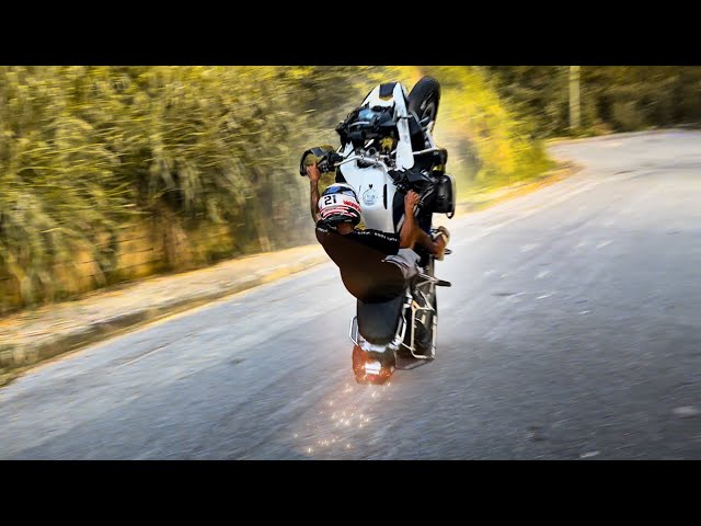 Learning to do a wheelie with my new motorcycle.