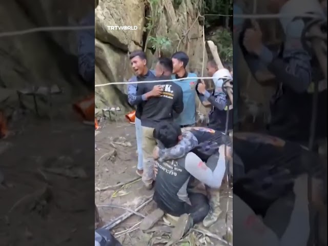Rescuers celebrate after 5 trapped in Laos cave for a week rescued