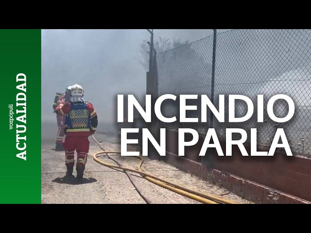 Incendio en Parla: las llamas afectan a camiones y casetas prefabricadas