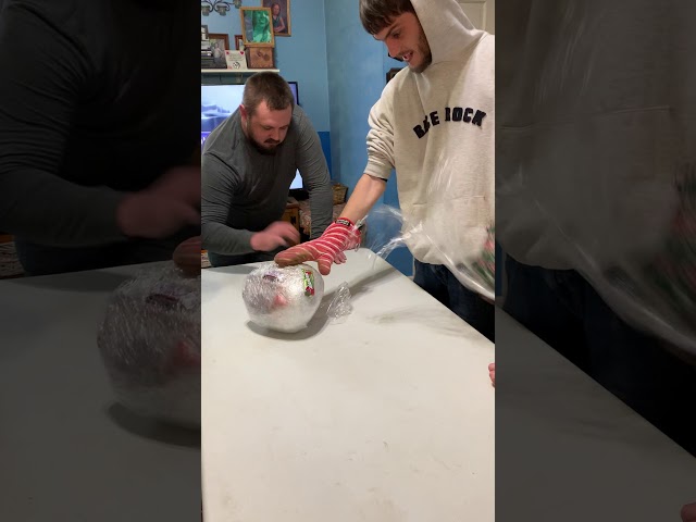 Saran Wrap ball game. MERRY CHRISTMAS