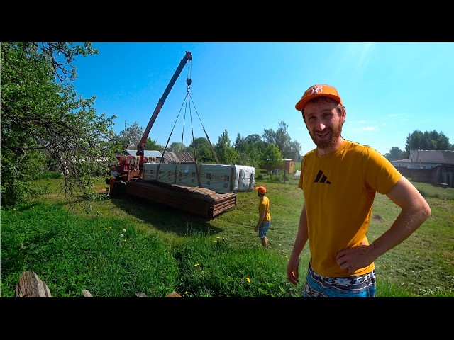 A utility shed was delivered to the construction site, and a caisson to the old house.
